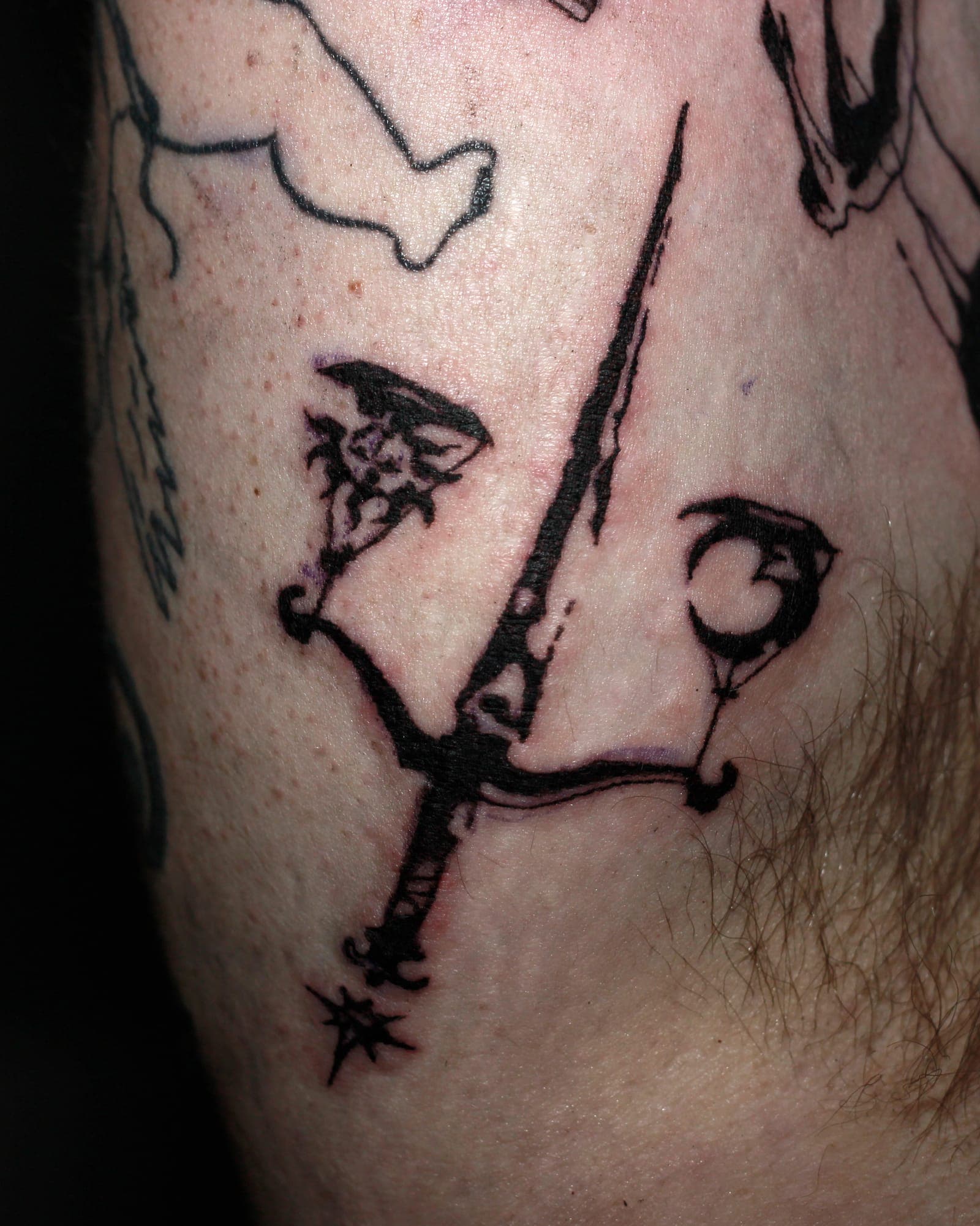Dagger tattoo